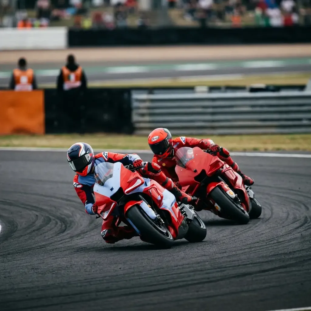 Illustration for our Honda story: two MotoGP bikes racing closely on track.