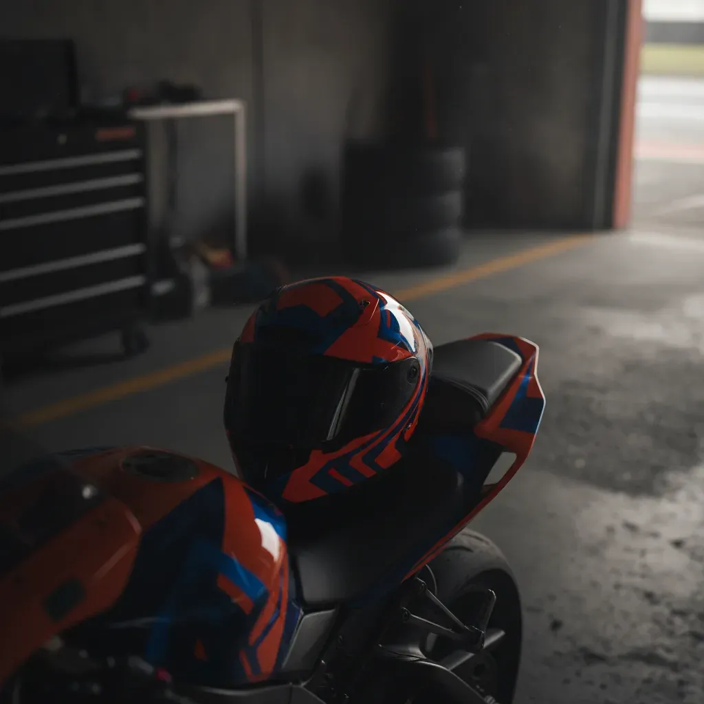 An empty chair inside the Red Bull KTM pit box, representing the vacant seat following a rider's departure announcement.
