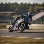 A MotoGP rider leans their motorcycle through a fast corner at the Brno circuit during the Czechia Grand Prix.