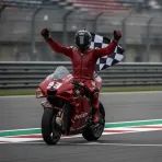 Marc Marquez winning the San Marino Grand Prix on his Ducati Lenovo Team bike.