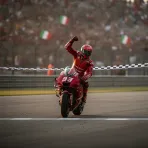 Marc Marquez celebrates winning the Sprint race at the San Marino Grand Prix.
